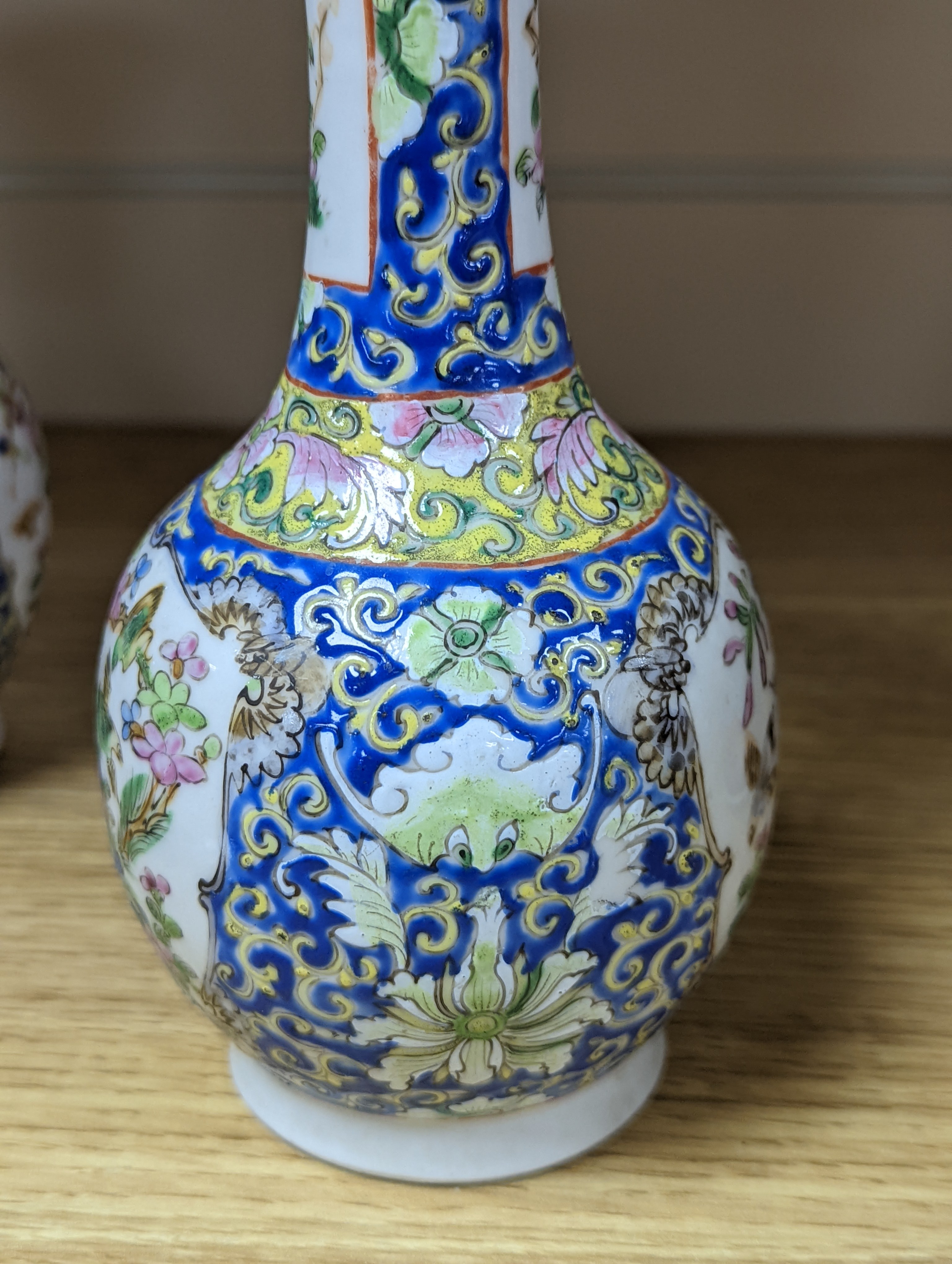 Four 19th century Chinese famille rose vases, 21cm